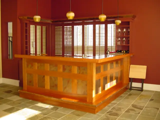 Custom wood bar with slatted panels