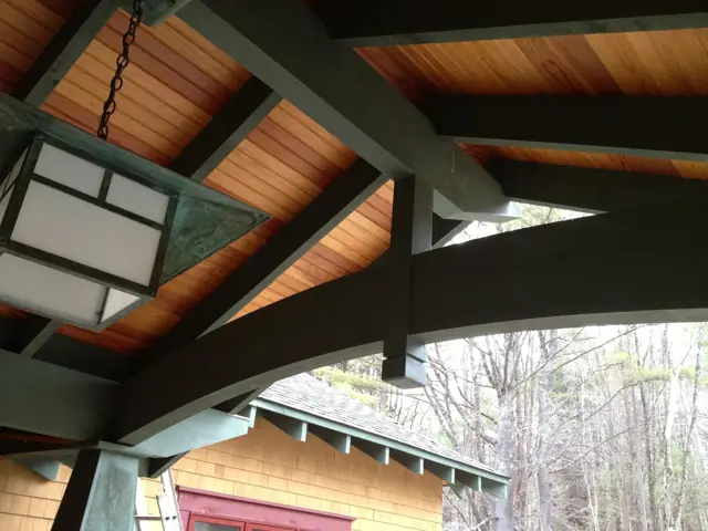 Exposed timber truss and wood ceiling detail