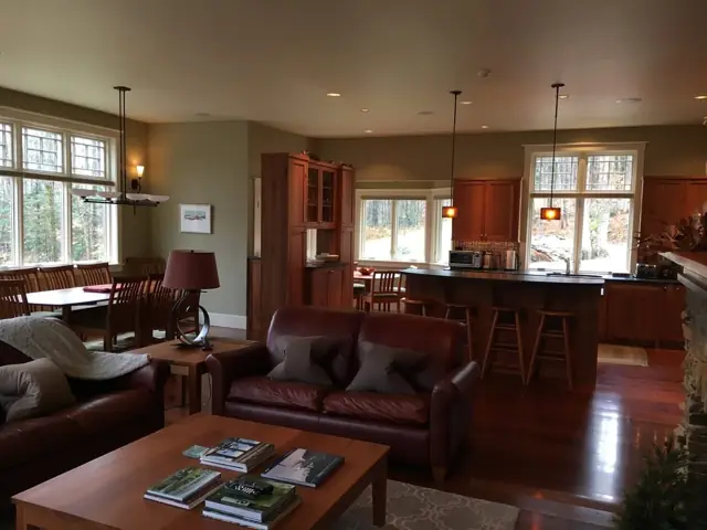 Open living and kitchen space with warm wood tones
